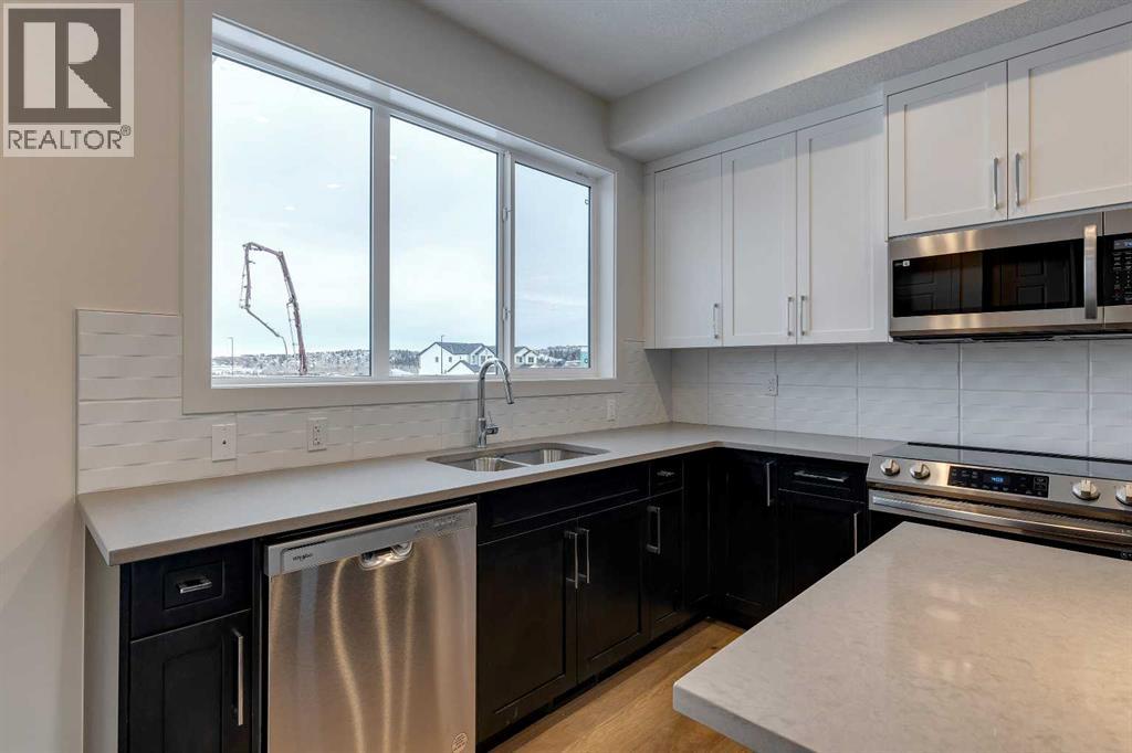 16 Sundown Place, Cochrane, Alberta  T4C 3H2 - Photo 7 - A2269276