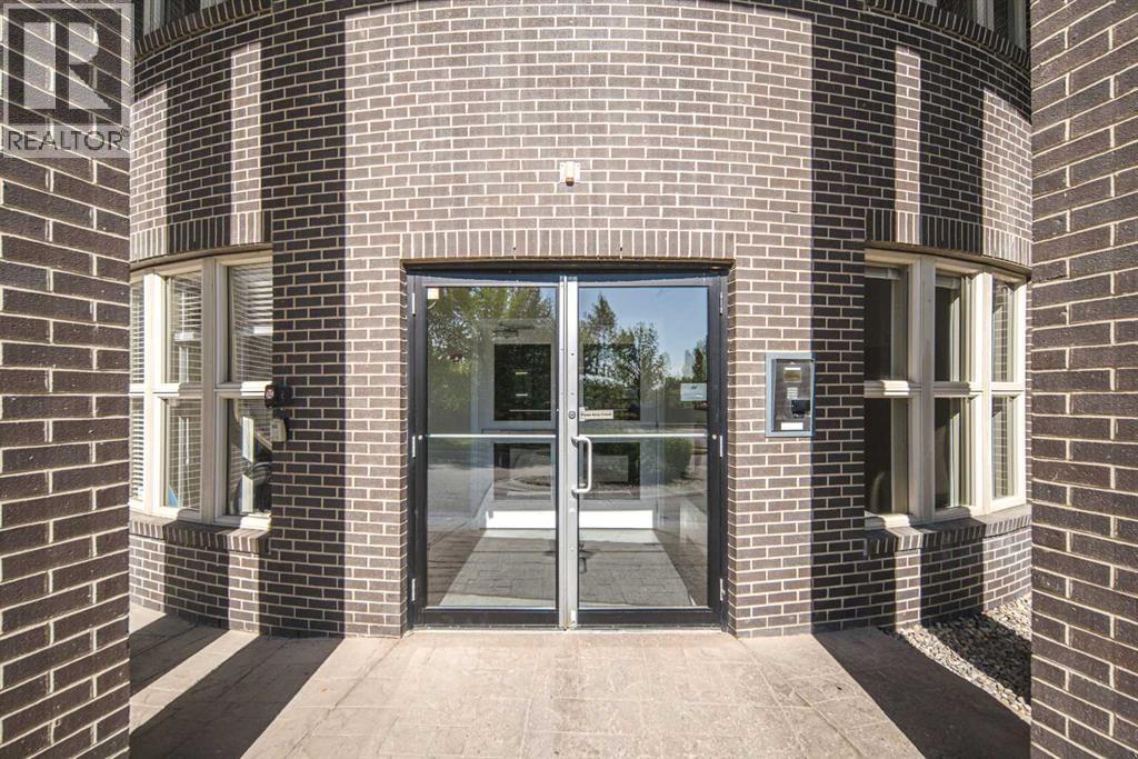 203, 88 Arbour Lake Road Nw, Calgary, Alberta  T3G 0C2 - Photo 5 - A2295878