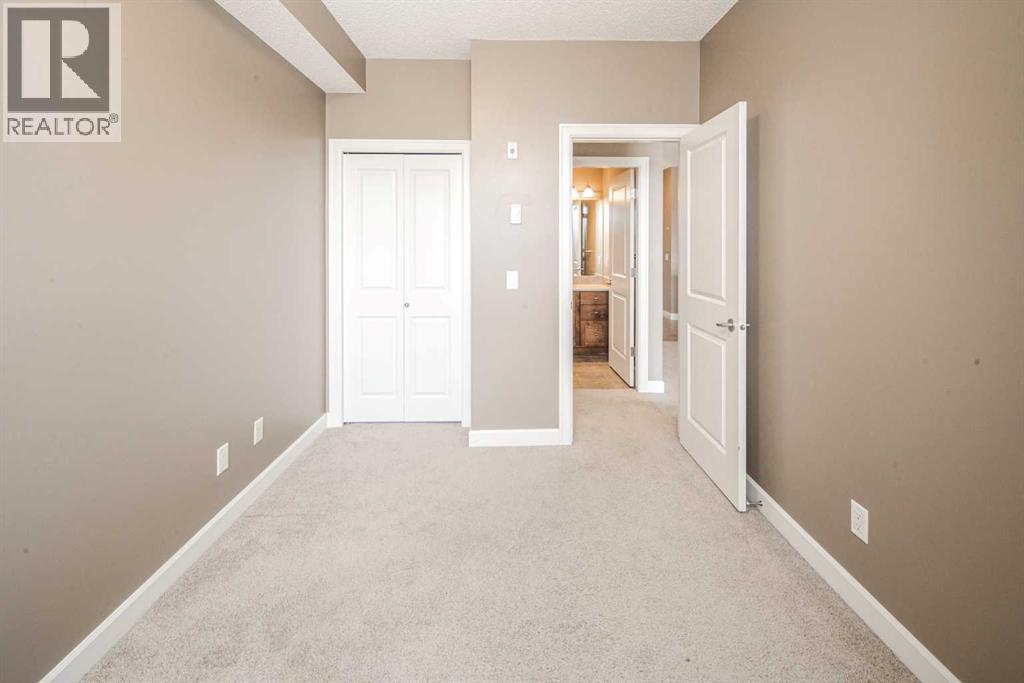 203, 88 Arbour Lake Road Nw, Calgary, Alberta  T3G 0C2 - Photo 29 - A2295878