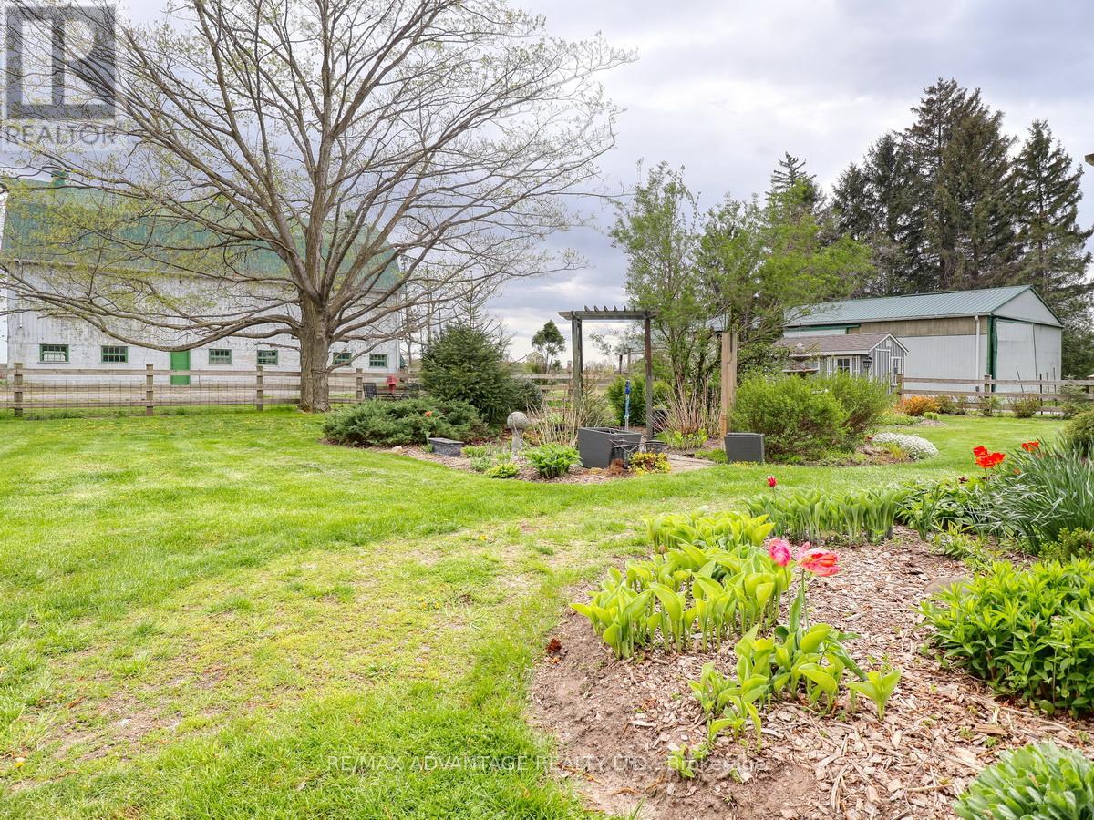 9907 Littlewood Drive, Middlesex Centre, Ontario  N6P 1P3 - Photo 4 - X13071304