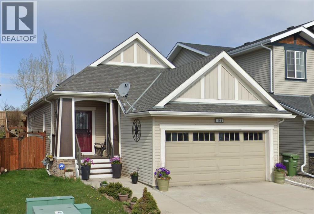 144 Reunion Close Nw, Airdrie, Alberta  T4B 0M3 - Photo 1 - A2286456