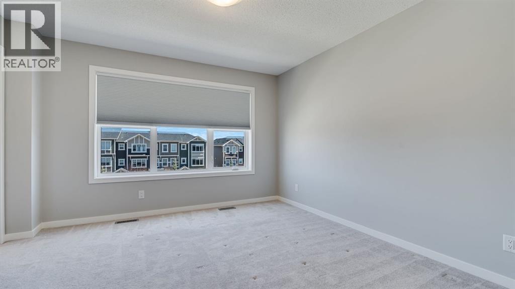 205 Sundown Road, Cochrane, Alberta  T4C 2M6 - Photo 14 - A2305216