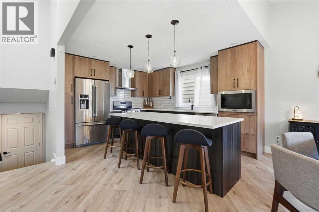 71 Woodfield Drive SW, Calgary, Alberta  T2W 3T3 - Photo 9 - A2307737