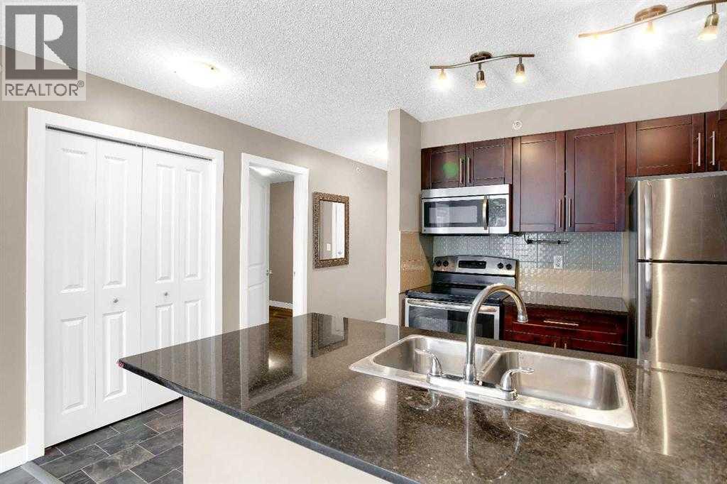9407, 403 Mackenzie Way SW, Airdrie, Alberta  T4B 3V7 - Photo 4 - A2293383