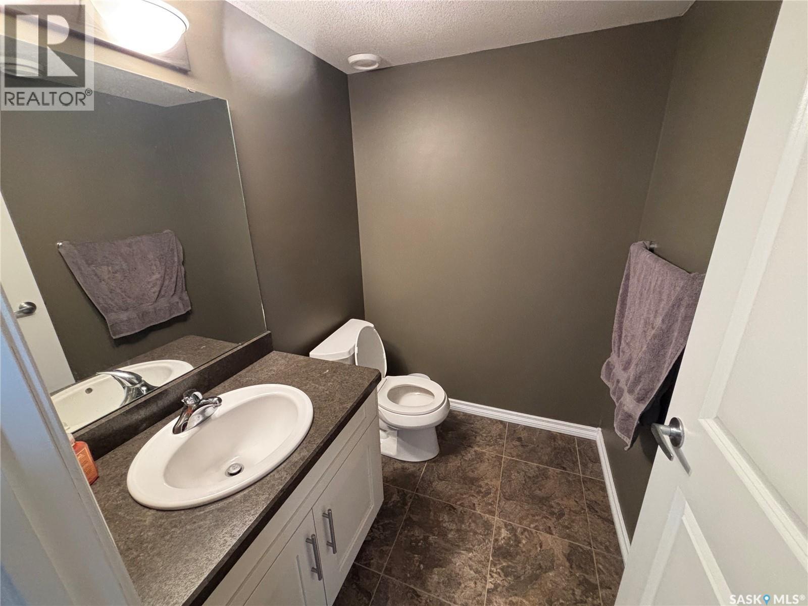 3 3225 Woodhams Drive E, Regina, Saskatchewan  S4V 3A2 - Photo 14 - SK034823