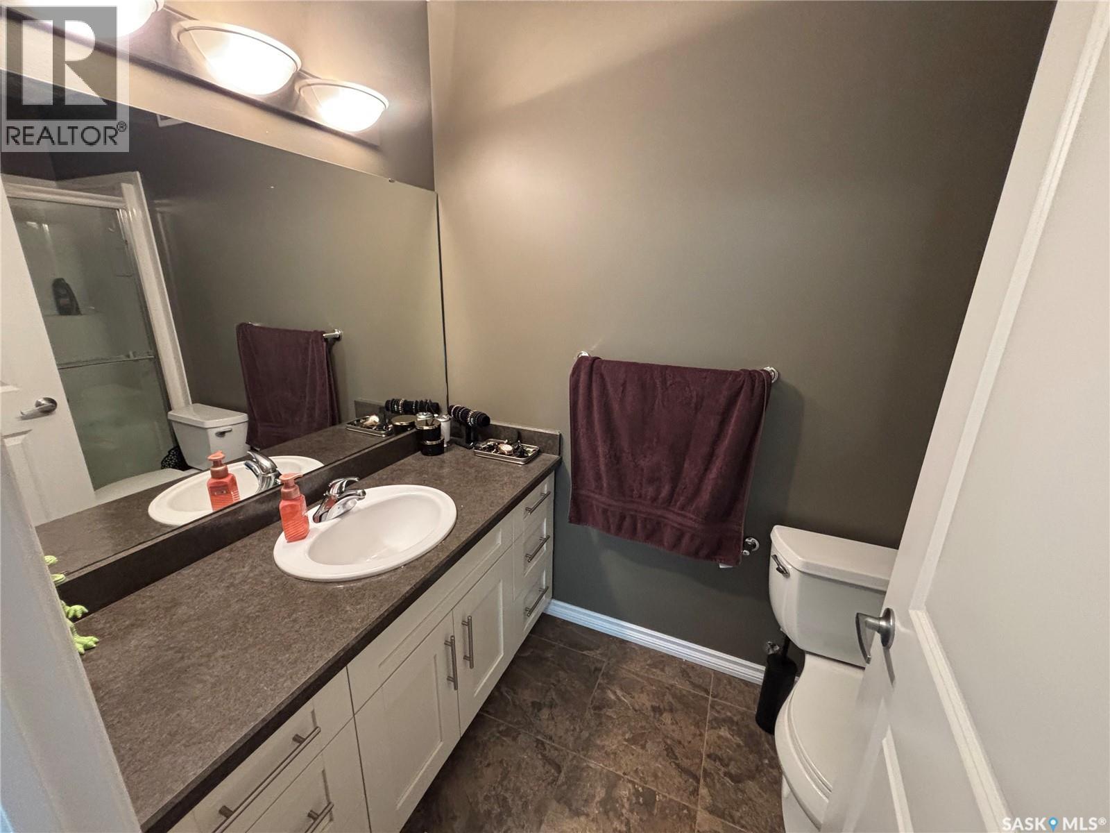 3 3225 Woodhams Drive E, Regina, Saskatchewan  S4V 3A2 - Photo 19 - SK034823