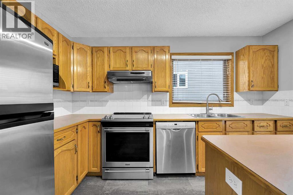 1427 Erin Drive SE, Airdrie, Alberta  T4B 2E9 - Photo 8 - A2305608