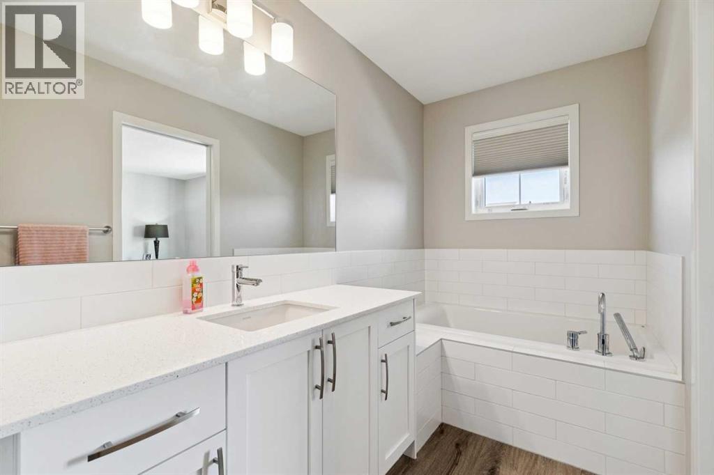 93 Wolf Gate, Okotoks, Alberta  T1S 5T9 - Photo 25 - A2307236