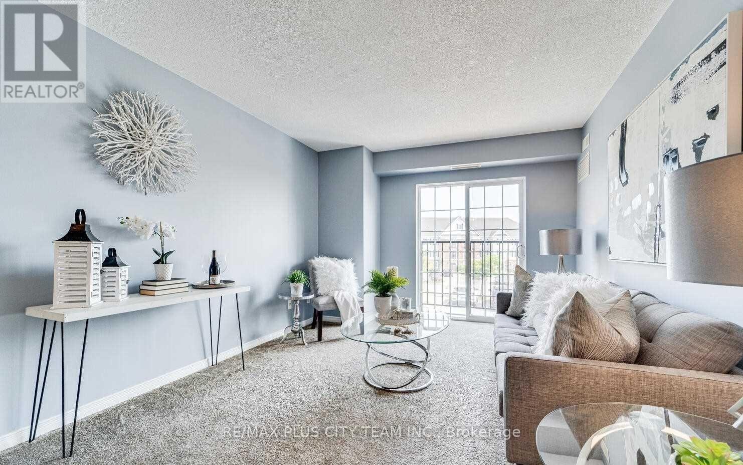 201 - 94 Aspen Springs Drive, Clarington, Ontario  L1C 5N4 - Photo 3 - E13085328