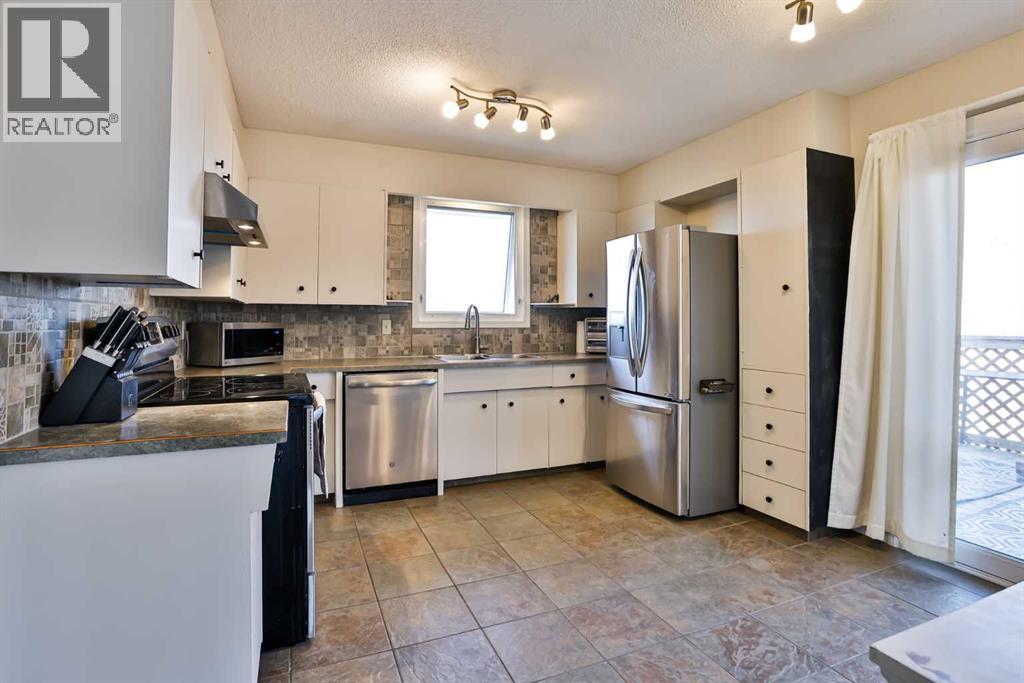 99 Lemoyne Crescent W, Lethbridge, Alberta  T1K 4A4 - Photo 7 - A2306254