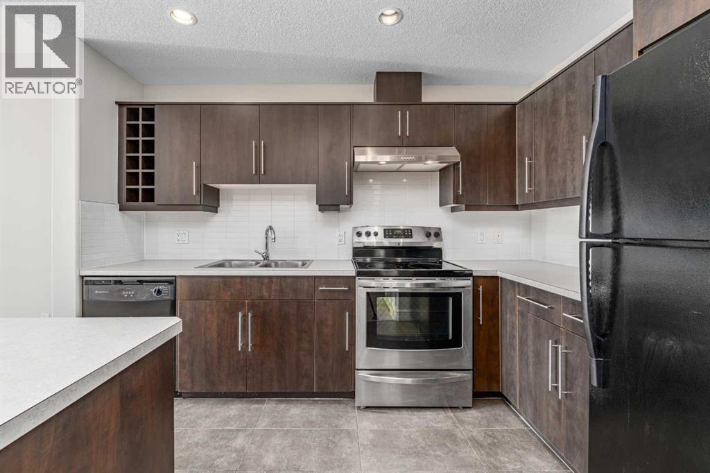 304, 55 Spruce Place Sw, Calgary, Alberta  T3C 3X5 - Photo 1 - A2297895