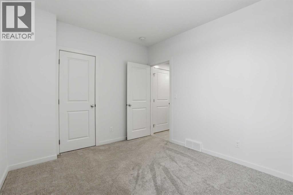 49 Belmont Drive Sw, Calgary, Alberta  T2X 4Z6 - Photo 21 - A2292315