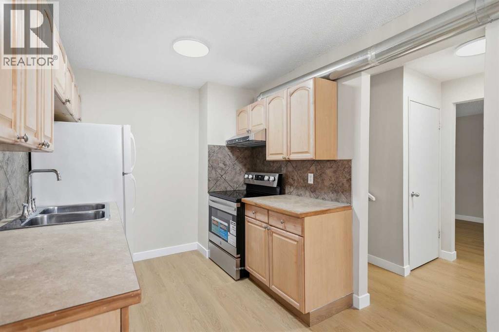8, 4936 Dalton Drive Nw, Calgary, Alberta  T3A 2E4 - Photo 9 - A2305538