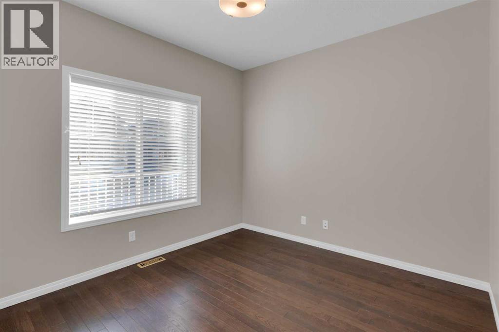 24 Fireside Burrow, Cochrane, Alberta  T4C 0T3 - Photo 3 - A2308248