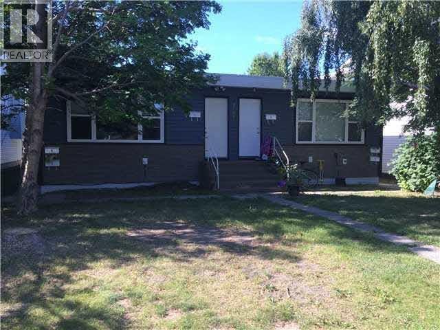 9705 103 Avenue, Fort St. John, British Columbia  V1J 2G9 - Photo 1 - C8067267