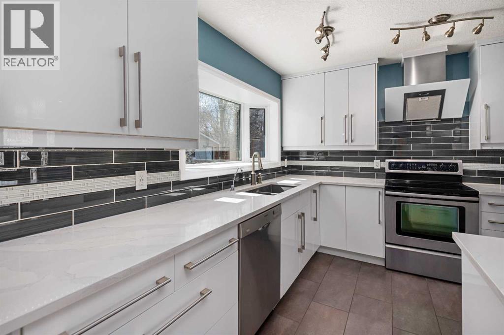 803 94 Avenue SW, Calgary, Alberta  T2V 0X8 - Photo 9 - A2304250