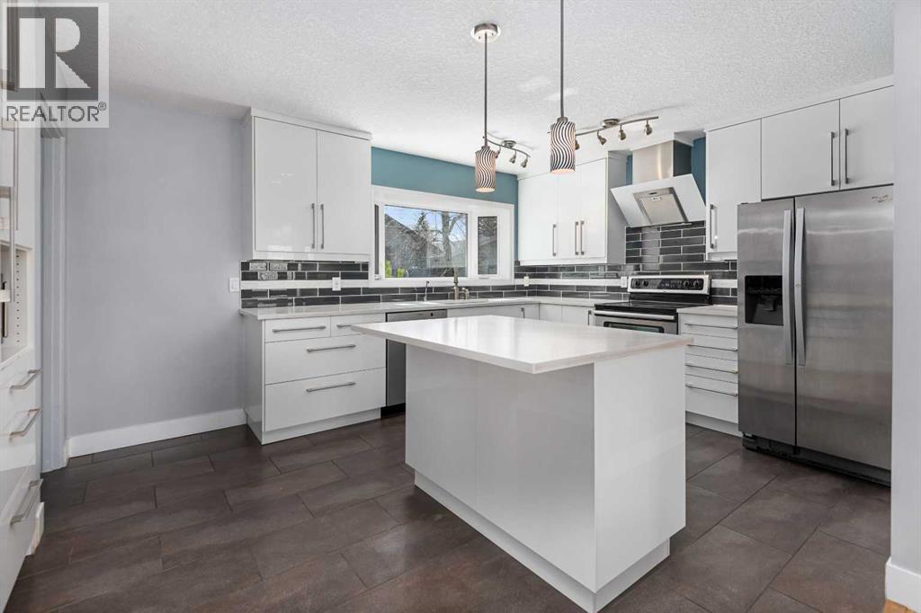 803 94 Avenue SW, Calgary, Alberta  T2V 0X8 - Photo 7 - A2304250