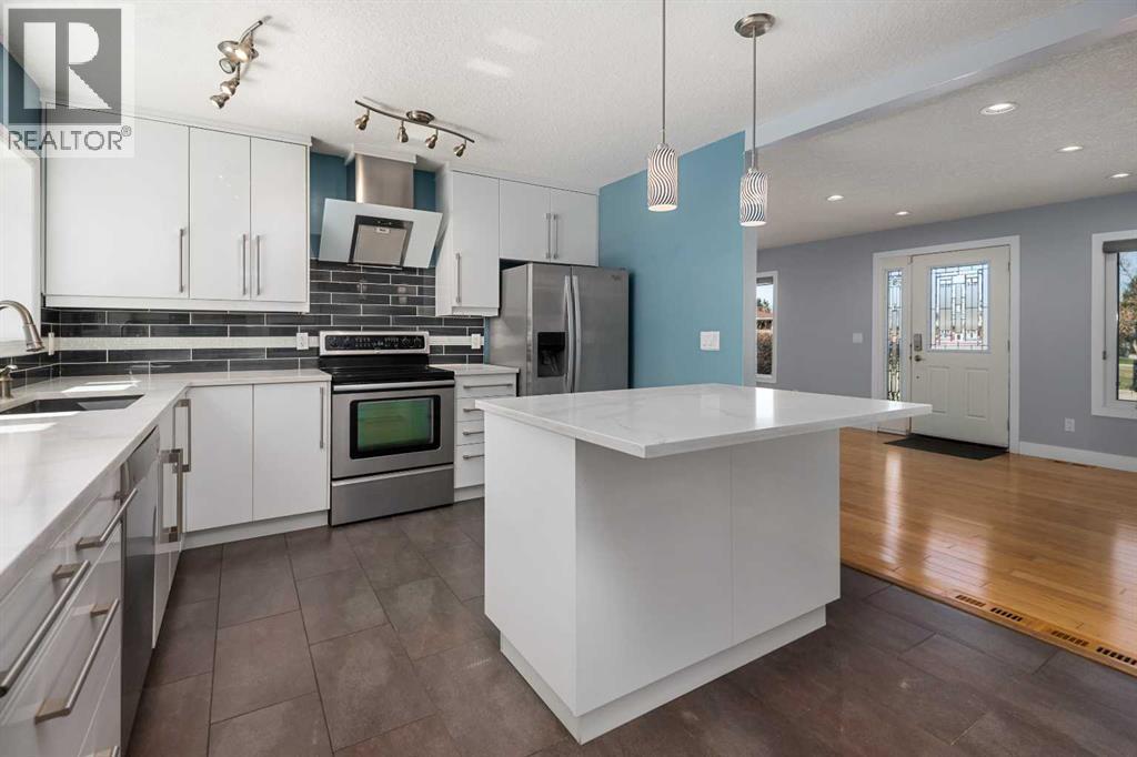 803 94 Avenue SW, Calgary, Alberta  T2V 0X8 - Photo 10 - A2304250