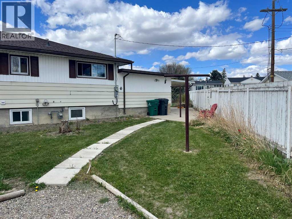 845 Stafford Drive N, Lethbridge, Alberta  T1H 2B7 - Photo 4 - A2308310