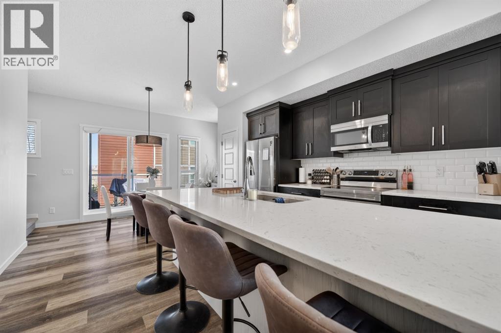 220 Harvest Grove Walk NE, Calgary, Alberta  T3K 2M1 - Photo 3 - A2300936