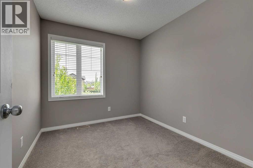 2 Windstone Lane SW, Airdrie, Alberta  T4B 0N7 - Photo 19 - A2303488