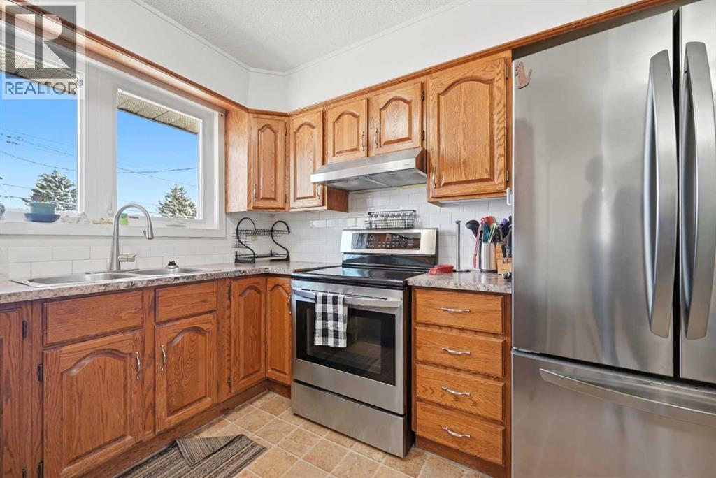 1012 Riddell Place SE, Calgary, Alberta  T2A 1Y5 - Photo 14 - A2306511