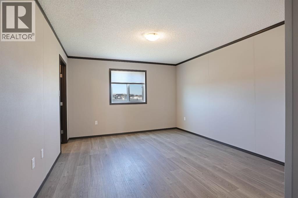 3 Meadowplace Manor E, Brooks, Alberta  T1R 0W9 - Photo 18 - A2307902