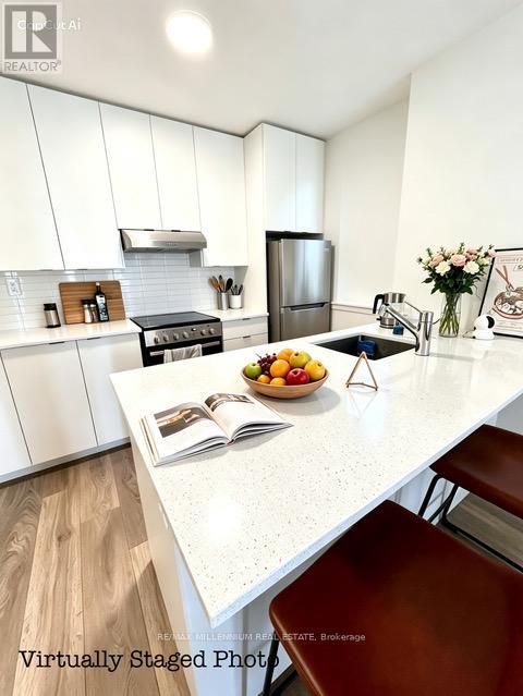 Th-105 - 145 Canon Jackson Drive, Toronto, Ontario  M6M 0E1 - Photo 5 - W13087132
