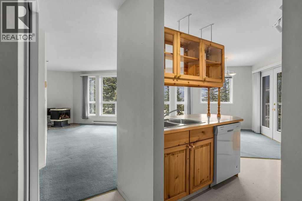 310, 1080c Cougar Creek Drive, Canmore, Alberta  T1W 2X9 - Photo 2 - A2308351