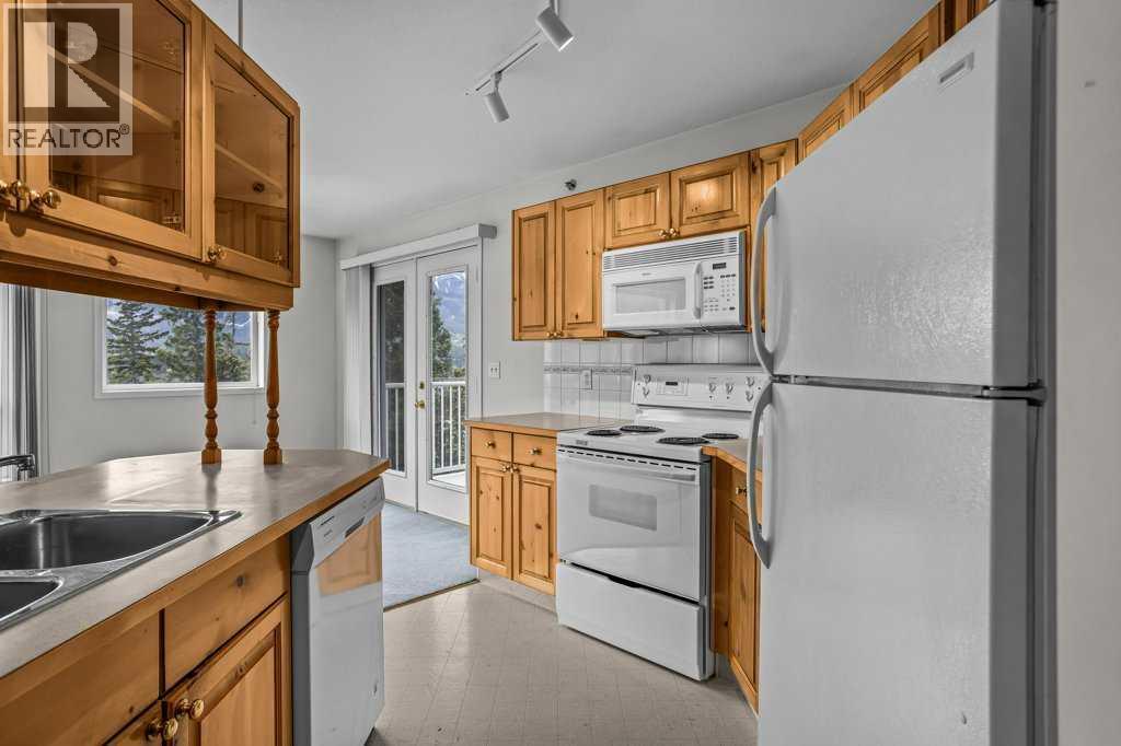 310, 1080c Cougar Creek Drive, Canmore, Alberta  T1W 2X9 - Photo 3 - A2308351