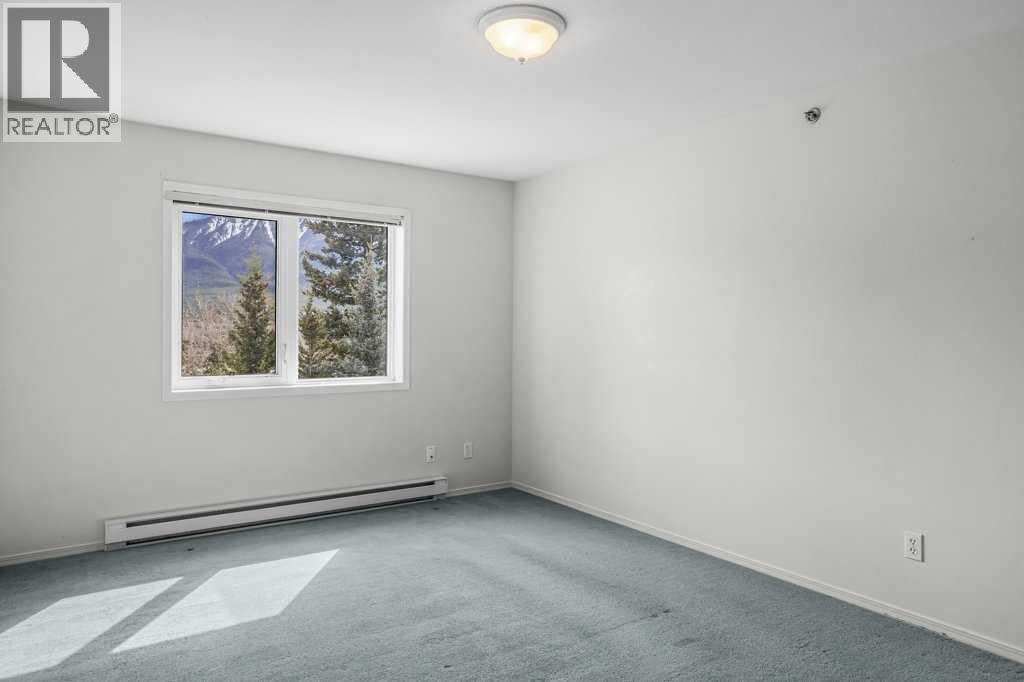 310, 1080c Cougar Creek Drive, Canmore, Alberta  T1W 2X9 - Photo 28 - A2308351