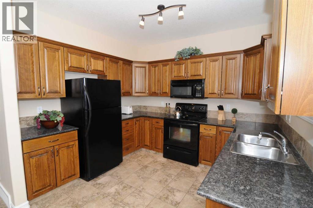 7, 762 Heritage Boulevard W, Lethbridge, Alberta  T1K 0W1 - Photo 10 - A2293953