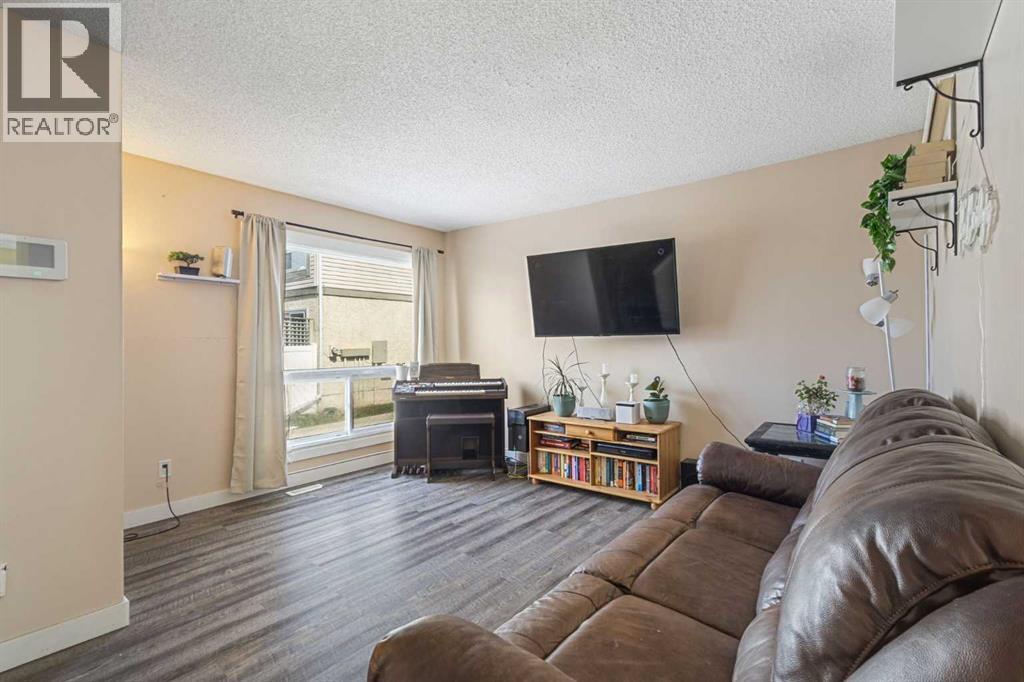 104 Deer Ridge Lane SE, Calgary, Alberta  T2J 6N4 - Photo 4 - A2303883
