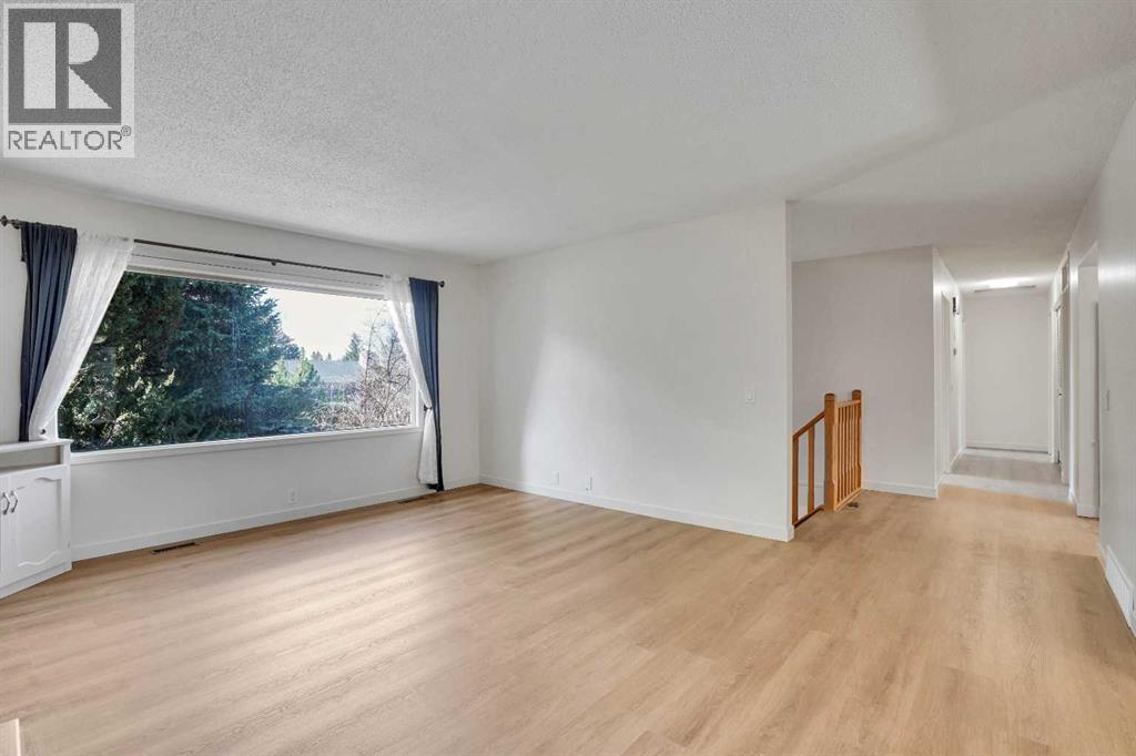 208 Dalcastle Court Nw, Calgary, Alberta  T3A 2A7 - Photo 6 - A2306174