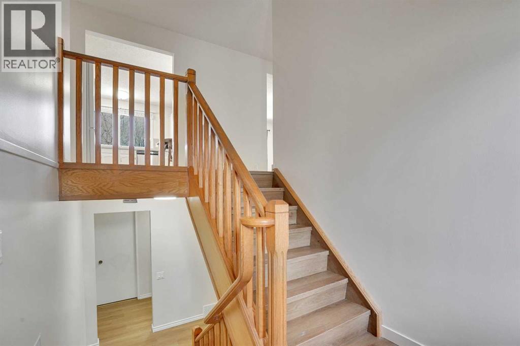 208 Dalcastle Court Nw, Calgary, Alberta  T3A 2A7 - Photo 4 - A2306174