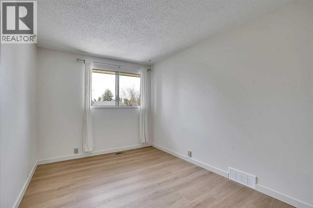 208 Dalcastle Court Nw, Calgary, Alberta  T3A 2A7 - Photo 25 - A2306174