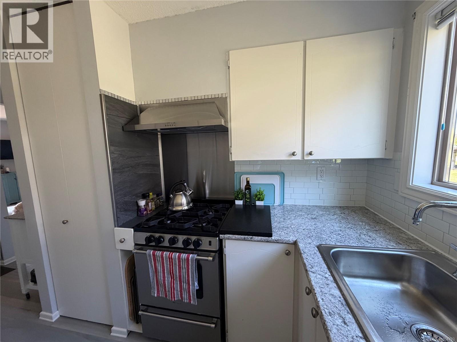 703 Nigei St, Port Alice, British Columbia  V0N 2N0 - Photo 5 - 1034793