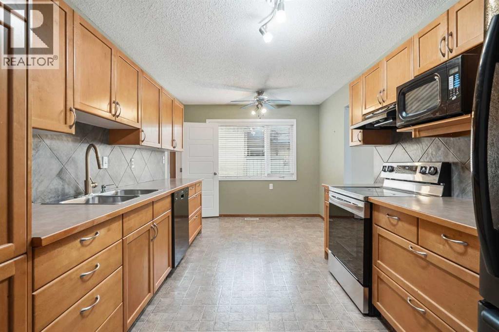 138 Midcrest Crescent SE, Calgary, Alberta  T2X 1B6 - Photo 8 - A2304491