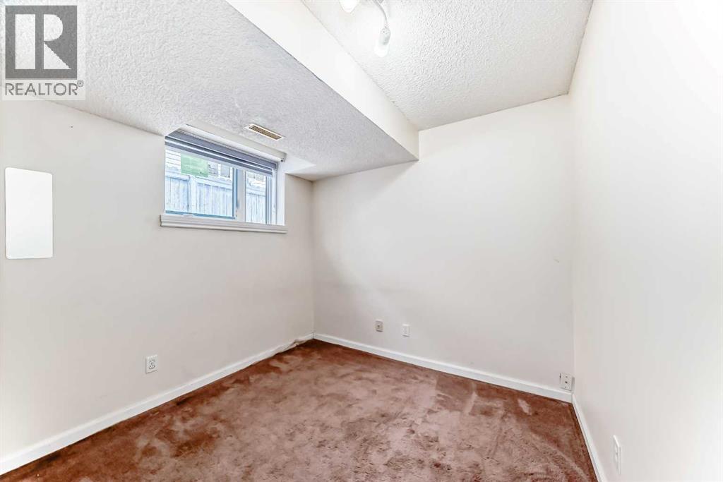 38 San Diego Way NE, Calgary, Alberta  T1Y 7A4 - Photo 34 - A2307988
