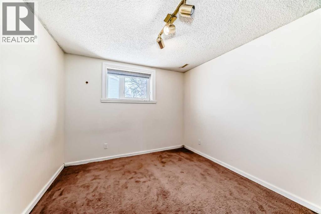 38 San Diego Way NE, Calgary, Alberta  T1Y 7A4 - Photo 32 - A2307988
