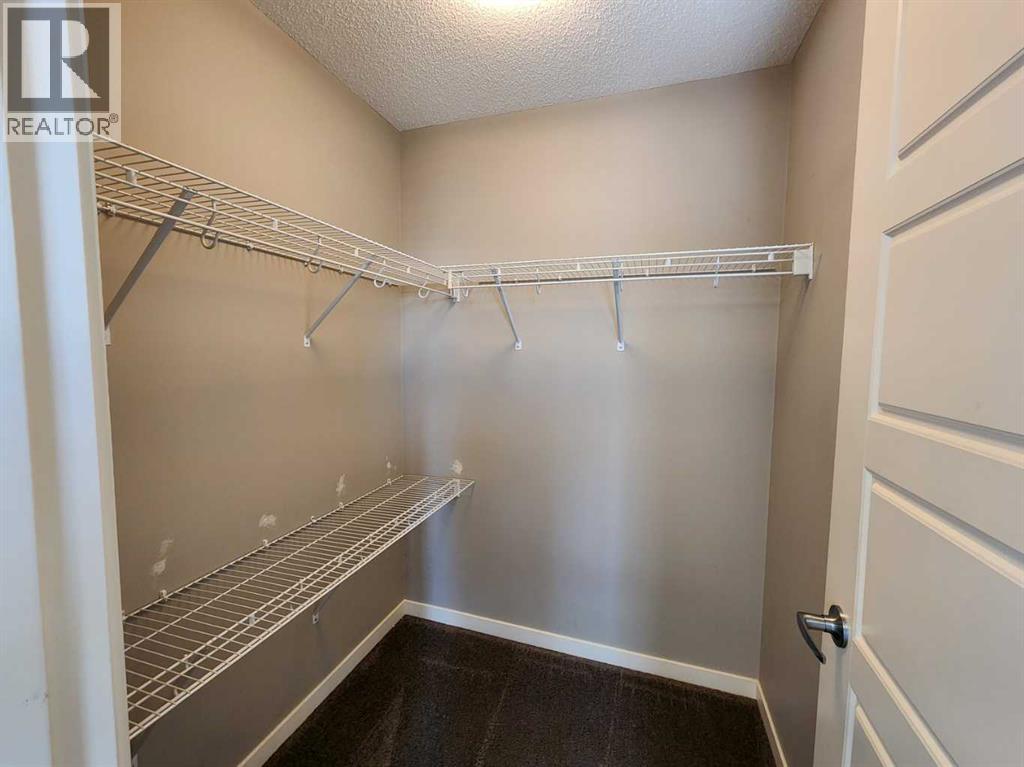 217 Panatella Walk NW, Calgary, Alberta  T3K 0Z3 - Photo 23 - A2283128