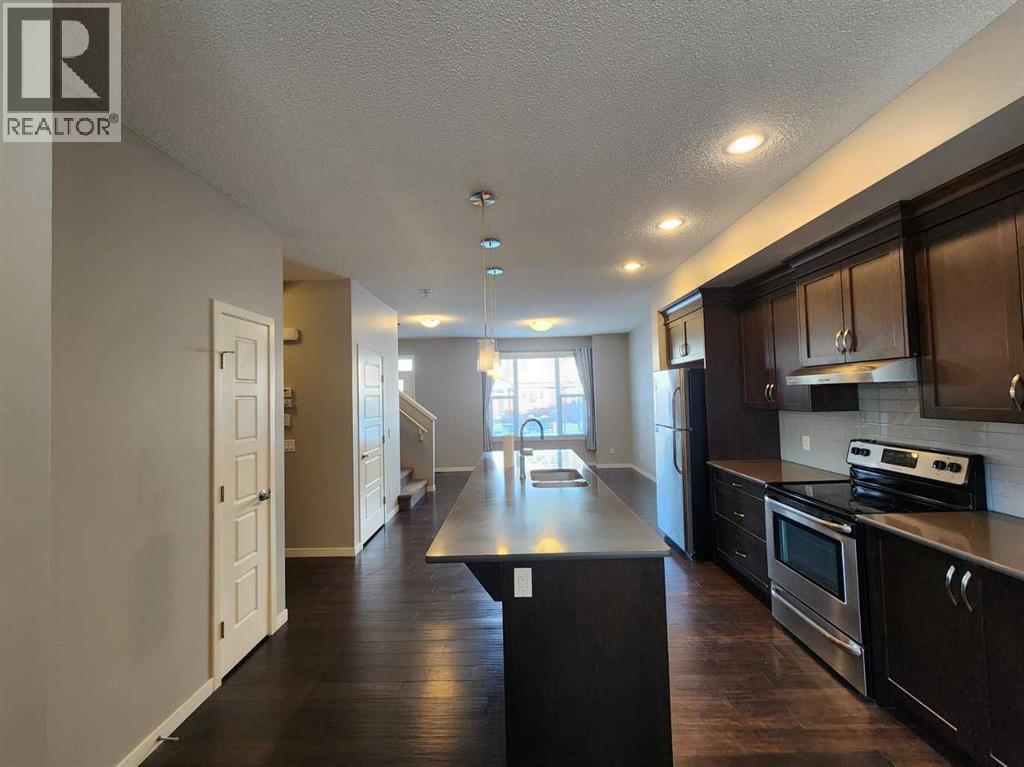 217 Panatella Walk NW, Calgary, Alberta  T3K 0Z3 - Photo 10 - A2283128