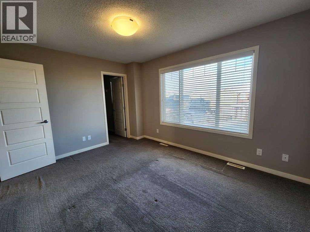 217 Panatella Walk NW, Calgary, Alberta  T3K 0Z3 - Photo 17 - A2283128
