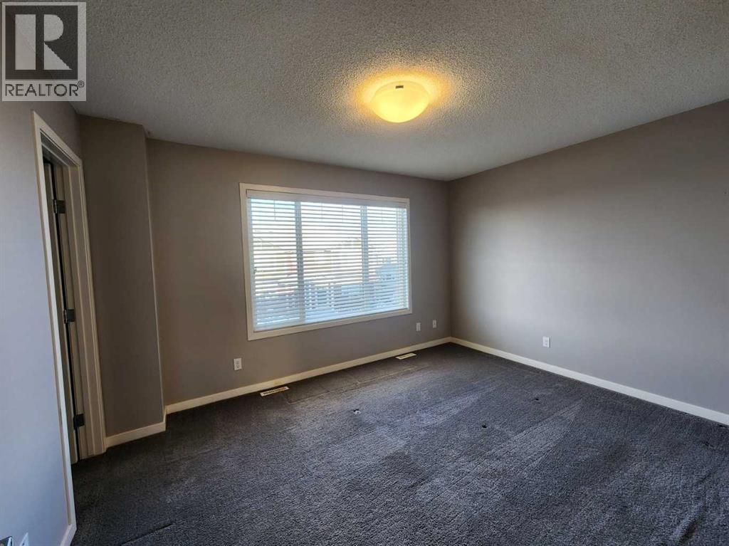 217 Panatella Walk NW, Calgary, Alberta  T3K 0Z3 - Photo 16 - A2283128