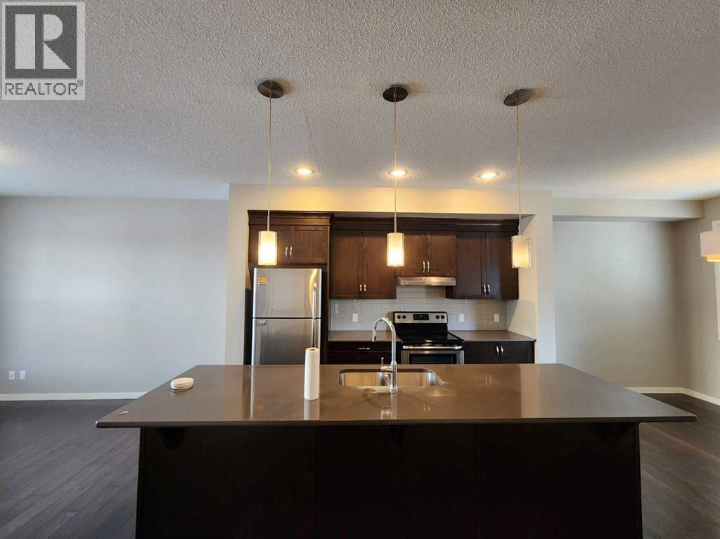 217 Panatella Walk NW, Calgary, Alberta  T3K 0Z3 - Photo 8 - A2283128