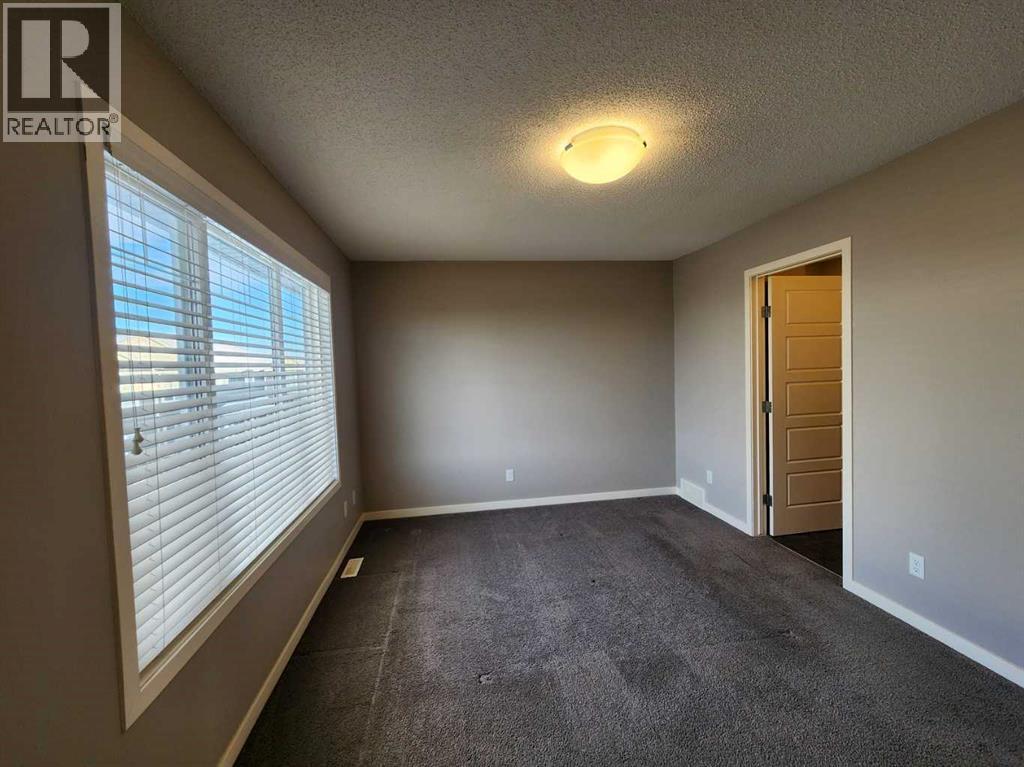 217 Panatella Walk NW, Calgary, Alberta  T3K 0Z3 - Photo 18 - A2283128