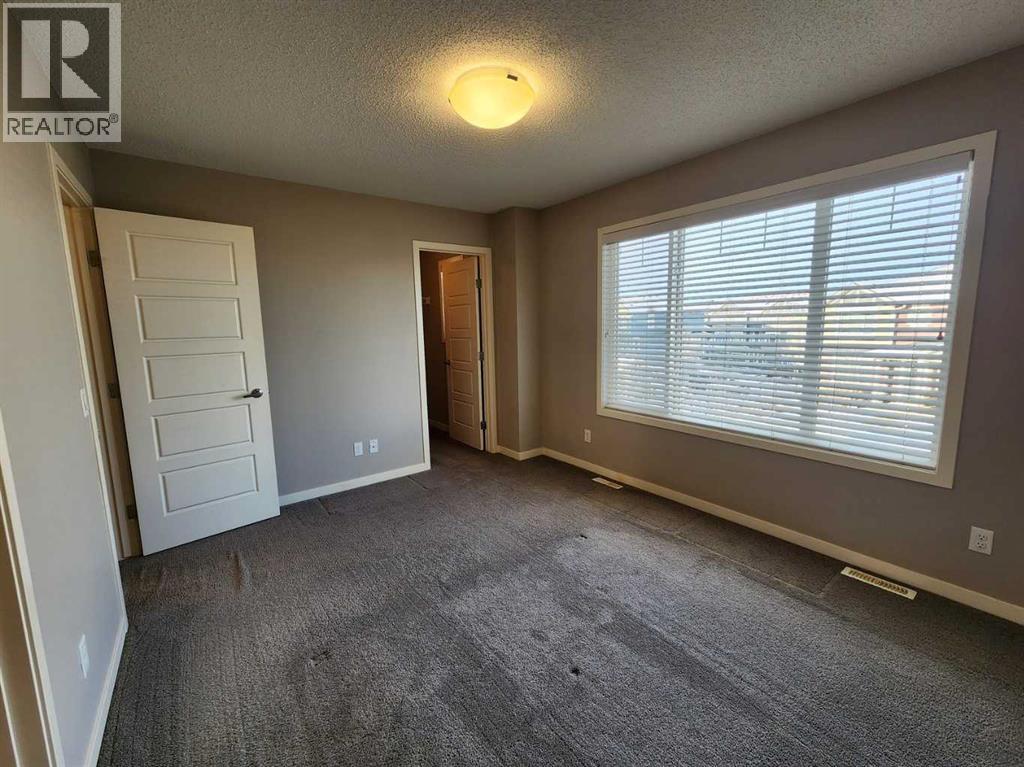 217 Panatella Walk NW, Calgary, Alberta  T3K 0Z3 - Photo 19 - A2283128