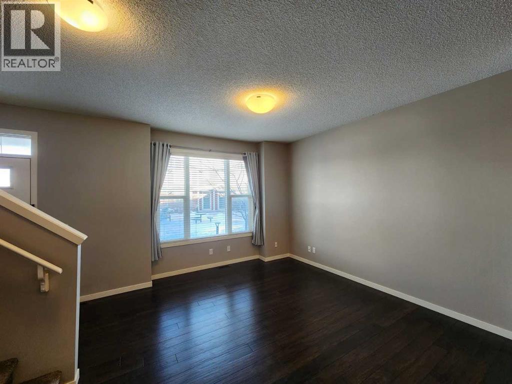 217 Panatella Walk NW, Calgary, Alberta  T3K 0Z3 - Photo 4 - A2283128