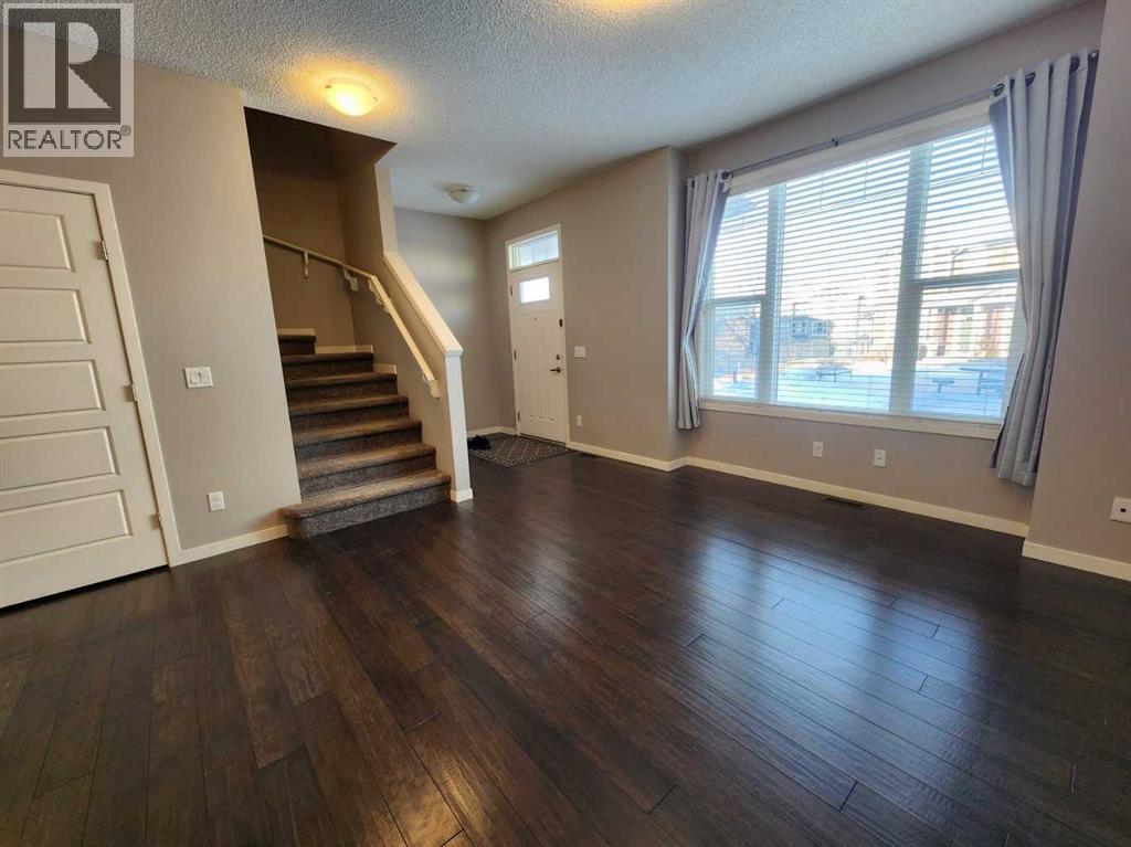 217 Panatella Walk NW, Calgary, Alberta  T3K 0Z3 - Photo 5 - A2283128