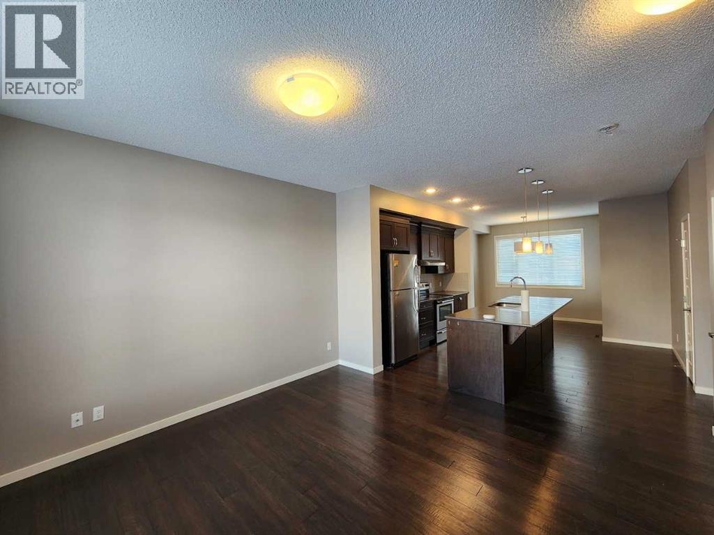 217 Panatella Walk NW, Calgary, Alberta  T3K 0Z3 - Photo 7 - A2283128